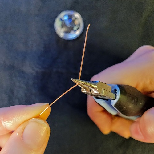 Jennifer Brooks's Alaskan Range Necklace - , Contemporary Wire Jewelry, Making Chain, Chain Making , Loops, Wire Loop, Wrapped Wire Loop, Texturing, , Add your first bead to the spool wire.